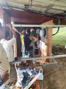 people building a house 